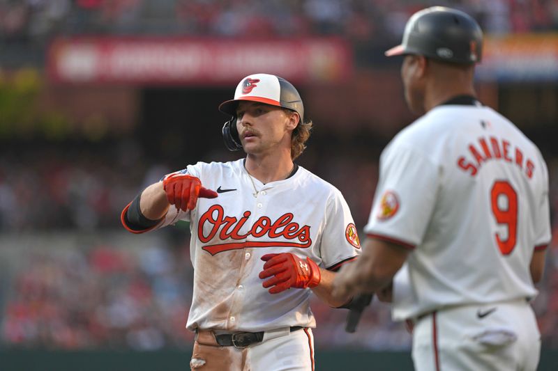 Jun 27, 2024; Baltimore, Maryland, USA; Baltimore Orioles shortstop Gunnar Henderson (2) gestures to his teammates following his single in the first inning against the Texas Rangers at Oriole Park at Camden Yards. Mandatory Credit: Mitch Stringer-USA TODAY Sports