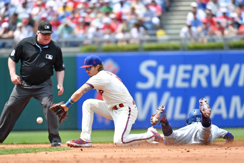 Jun 11, 2023; Philadelphia, Pennsylvania, USA; Los Angeles Dodgers right fielder Mookie Betts (50) steals second base ahead of tag by Philadelphia Phillies second baseman Bryson Stott (5) during the second inning at Citizens Bank Park. Mandatory Credit: Eric Hartline-USA TODAY Sports