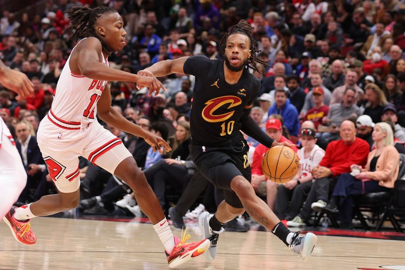 CHICAGO, ILLINOIS - FEBRUARY 28: Darius Garland #10 of the Cleveland Cavaliers drives to the basket against Ayo Dosunmu #12 of the Chicago Bulls during the first half at the United Center on February 28, 2024 in Chicago, Illinois. NOTE TO USER: User expressly acknowledges and agrees that, by downloading and or using this photograph, User is consenting to the terms and conditions of the Getty Images License Agreement. (Photo by Michael Reaves/Getty Images)