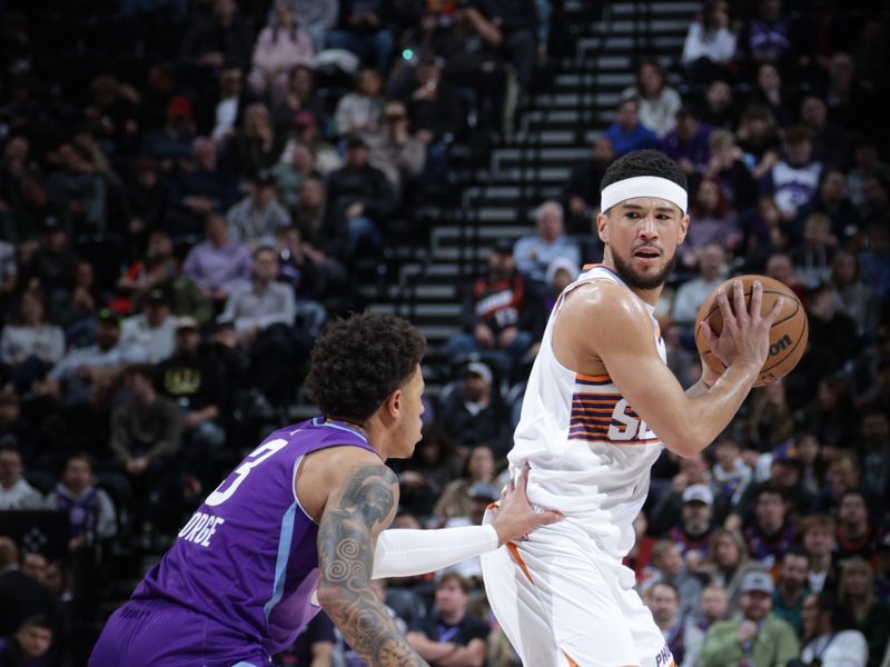 SALT LAKE CITY, UT - DECEMBER 13:  Devin Booker #1 of the Phoenix Suns handles the ball during the game against the Utah Jazz  during a regular season game on December 13, 2024 at Delta Center in Salt Lake City, Utah. NOTE TO USER: User expressly acknowledges and agrees that, by downloading and or using this Photograph, User is consenting to the terms and conditions of the Getty Images License Agreement. Mandatory Copyright Notice: Copyright 2024 NBAE (Photo by Melissa Majchrzak/NBAE via Getty Images)