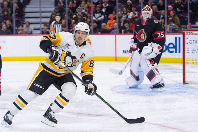 Dec 18, 2025; Ottawa, Ontario, CAN; Pittsburgh Penguins center Sidney Crosby (87) follows the puck the second period against the Ottawa Senators at the Canadian Tire Centre. Mandatory Credit: Marc DesRosiers-IMAGN Images