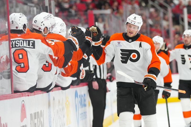 Oct 11, 2025; Raleigh, North Carolina, USA;  Philadelphia Flyers defenseman Travis Sanheim (6) celebrates his goal against the Carolina Hurricanes during the third period at Lenovo Center. Mandatory Credit: James Guillory-Imagn Images
