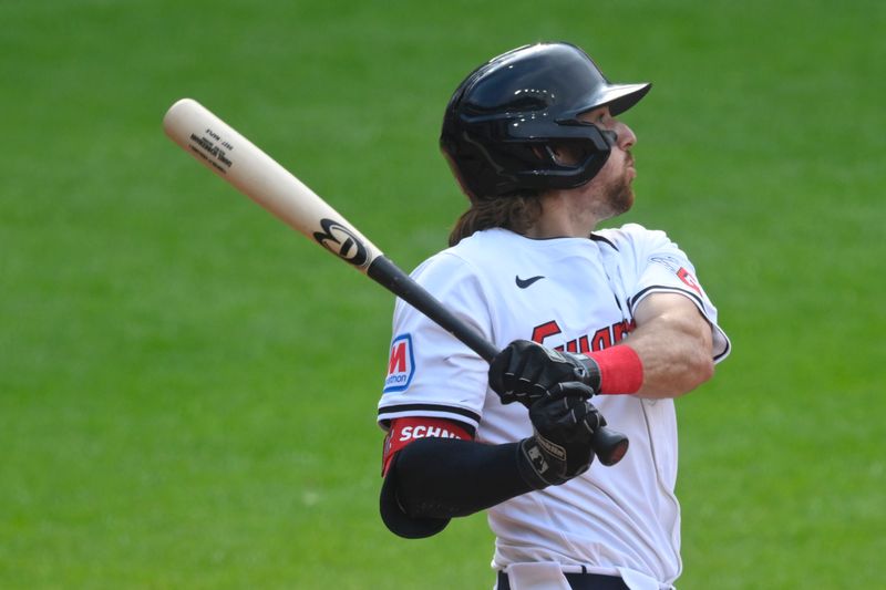  Jun 22, 2024; Cleveland, Ohio, USA; Cleveland Guardians center fielder Daniel Schneemann (10) hits a solo home run in the sixth inning against the Toronto Blue Jays at Progressive Field. Mandatory Credit: David Richard-USA TODAY Sports