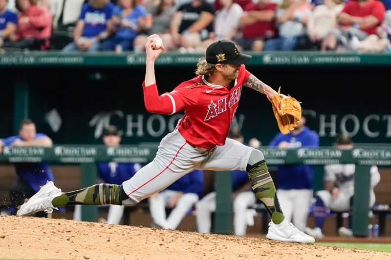 May 18, 2024; Arlington, Texas, USA; Los Angeles Angels relief pitcher Adam Cimber (90) throws to the plate during the seventh inning against the Texas Rangers at Globe Life Field. Mandatory Credit: Raymond Carlin III-USA TODAY Sports