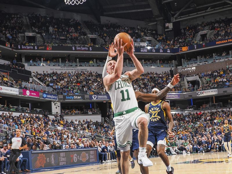 INDIANAPOLIS, IN - OCTOBER 30: Payton Pritchard #11 of the Boston Celtics shoots the ball during the game on October 30, 2024 at Gainbridge Fieldhouse in Indianapolis, Indiana. NOTE TO USER: User expressly acknowledges and agrees that, by downloading and or using this Photograph, user is consenting to the terms and conditions of the Getty Images License Agreement. Mandatory Copyright Notice: Copyright 2024 NBAE (Photo by Ron Hoskins/NBAE via Getty Images)