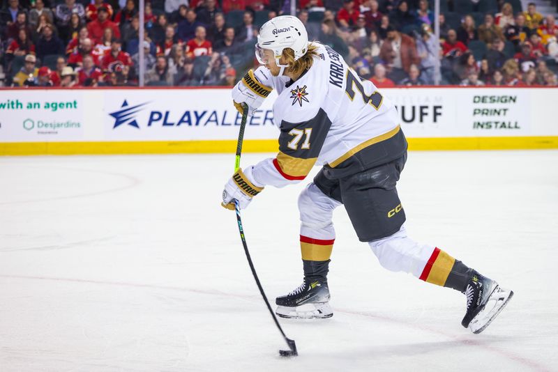 Mar 14, 2024; Calgary, Alberta, CAN; Vegas Golden Knights center William Karlsson (71) shoots the puck against the Calgary Flames during the first period at Scotiabank Saddledome. Mandatory Credit: Sergei Belski-USA TODAY Sports