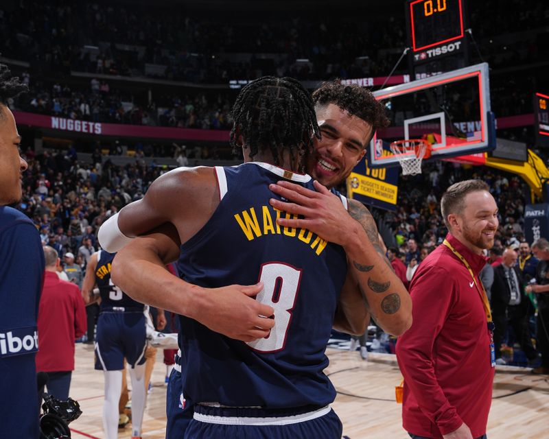 DENVER, CO - NOVEMBER 6: Peyton Watson #8 and Michael Porter Jr. #1 of the Denver Nuggets embrace after the game against the Oklahoma City Thunder on November 6, 2024 at Ball Arena in Denver, Colorado. NOTE TO USER: User expressly acknowledges and agrees that, by downloading and/or using this Photograph, user is consenting to the terms and conditions of the Getty Images License Agreement. Mandatory Copyright Notice: Copyright 2024 NBAE (Photo by Garrett Ellwood/NBAE via Getty Images)