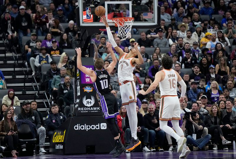 SACRAMENTO, CALIFORNIA - FEBRUARY 22: Victor Wembanyama #1 of the San Antonio Spurs was called for goal tending on this block attempt on Domantas Sabonis #10 of the Sacramento Kings in the second quarter at Golden 1 Center on February 22, 2024 in Sacramento, California. NOTE TO USER: User expressly acknowledges and agrees that, by downloading and or using this photograph, User is consenting to the terms and conditions of the Getty Images License Agreement. (Photo by Thearon W. Henderson/Getty Images)