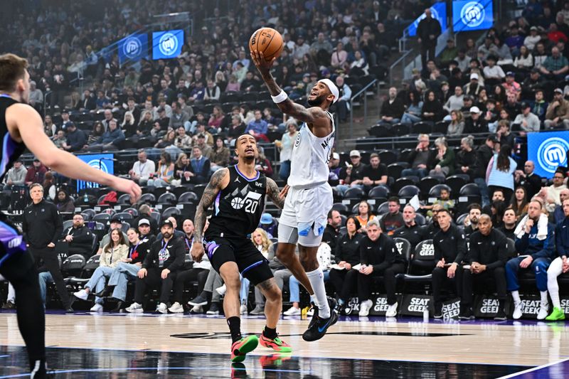 SALT LAKE CITY, UT - FEBRUARY 28:  Nickeil Alexander-Walker #9 of the Minnesota Timberwolves drives to the basket during the game against the Utah Jazz on February 28, 2025 at Delta Center in Salt Lake City, Utah. NOTE TO USER: User expressly acknowledges and agrees that, by downloading and or using this Photograph, User is consenting to the terms and conditions of the Getty Images License Agreement. Mandatory Copyright Notice: Copyright 2025 NBAE (Photo by Jamie Sabau/NBAE via Getty Images)