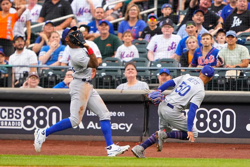 Jul 16, 2023; New York City, New York, USA; Los Angeles Dodgers right fielder Jason Heyward (23) catches a foul ball hit by New York Mets left fielder Mark Canha (not pictured) during the second inning at Citi Field. Mandatory Credit: Gregory Fisher-USA TODAY Sports