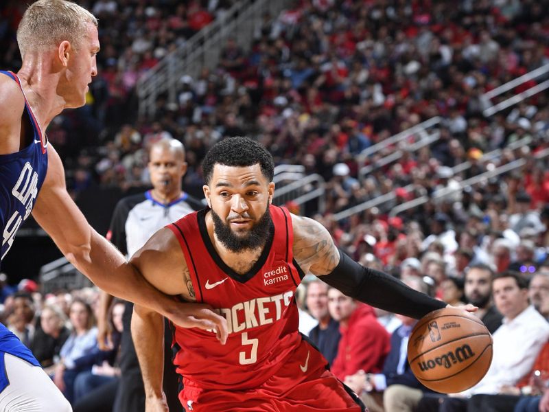 HOUSTON, TX - MARCH 6: Fred VanVleet #5 of the Houston Rockets handles the ball during the game against the LA Clippers on March 6, 2024 at the Toyota Center in Houston, Texas. NOTE TO USER: User expressly acknowledges and agrees that, by downloading and or using this photograph, User is consenting to the terms and conditions of the Getty Images License Agreement. Mandatory Copyright Notice: Copyright 2024 NBAE (Photo by Logan Riely/NBAE via Getty Images)