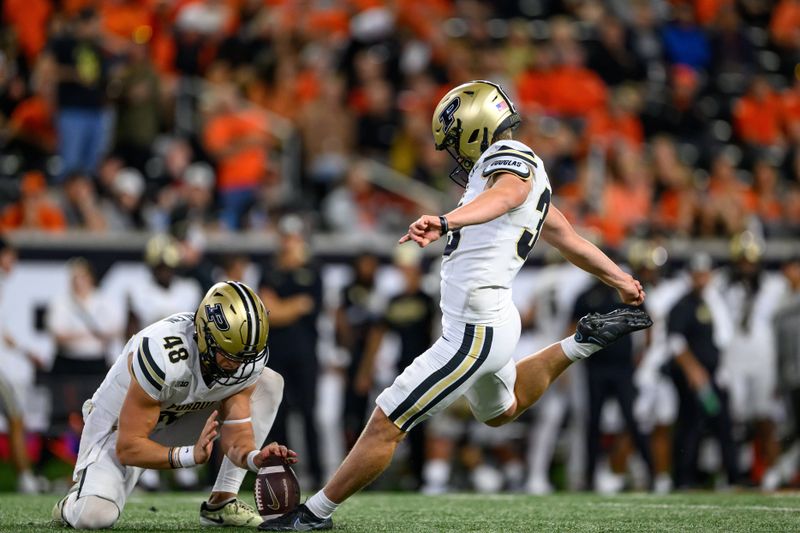 Sep 21, 2024; Corvallis, Oregon, USA; Purdue Boilermakers place kicker Spencer Porath (35) kicks an extra point during the second half against the Oregon State Beavers at Reser Stadium. Mandatory Credit: Craig Strobeck-Imagn Images