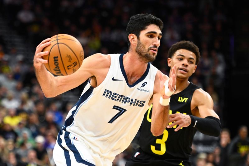 SALT LAKE CITY, UTAH - OCTOBER 23: Santi Aldama #7 of the Memphis Grizzlies dribbles the ball against the Utah Jazz during the third quarter at Delta Center on October 23, 2024 in Salt Lake City, Utah. NOTE TO USER: User expressly acknowledges and agrees that, by downloading and or using this photograph, User is consenting to the terms and conditions of the Getty Images License Agreement. (Photo by Alex Goodlett/Getty Images)