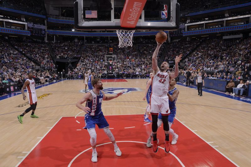 SACRAMENTO, CA - FEBRUARY 26: Kevin Love #42 of the Miami Heat drives to the basket during the game against the Sacramento Kings on February 26, 2024 at Golden 1 Center in Sacramento, California. NOTE TO USER: User expressly acknowledges and agrees that, by downloading and or using this Photograph, user is consenting to the terms and conditions of the Getty Images License Agreement. Mandatory Copyright Notice: Copyright 2024 NBAE (Photo by Rocky Widner/NBAE via Getty Images)