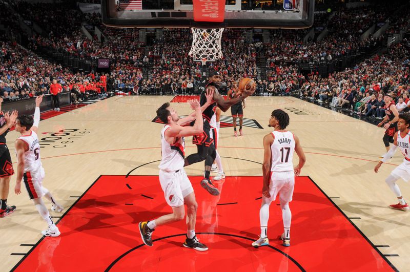 PORTLAND, OR - MARCH 24:  Patrick Beverley #21 of the Chicago Bulls goes to the basket during the game on March 24, 2023 at the Moda Center Arena in Portland, Oregon. NOTE TO USER: User expressly acknowledges and agrees that, by downloading and or using this photograph, user is consenting to the terms and conditions of the Getty Images License Agreement. Mandatory Copyright Notice: Copyright 2023 NBAE (Photo by Cameron Browne/NBAE via Getty Images)