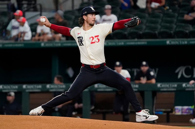 Jul 5, 2024; Arlington, Texas, USA; Texas Rangers pitcher Michael Lorenzen (23) throws to the plate during the first inning against the Tampa Bay Rays at Globe Life Field. Mandatory Credit: Raymond Carlin III-USA TODAY Sports
