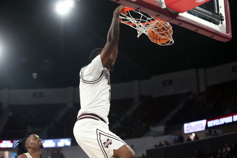 Dec 3, 2023; Starkville, Mississippi, USA; Mississippi State Bulldogs forward D.J. Jeffries (0) dunks during the second half against the Southern Jaguars at Humphrey Coliseum. Mandatory Credit: Petre Thomas-USA TODAY Sports