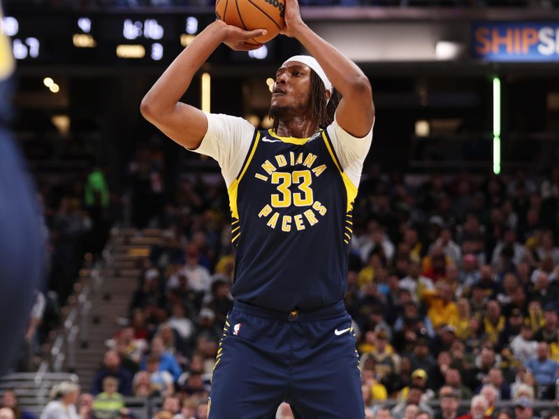 INDIANAPOLIS, IN - FEBRUARY 24:  Myles Turner #33 of the Indiana Pacers shoots the ball during the game against the Denver Nuggets on February 24, 2025 at Gainbridge Fieldhouse in Indianapolis, Indiana. NOTE TO USER: User expressly acknowledges and agrees that, by downloading and or using this Photograph, user is consenting to the terms and conditions of the Getty Images License Agreement. Mandatory Copyright Notice: Copyright 2025 NBAE (Photo by Pepper Robinson/NBAE via Getty Images)