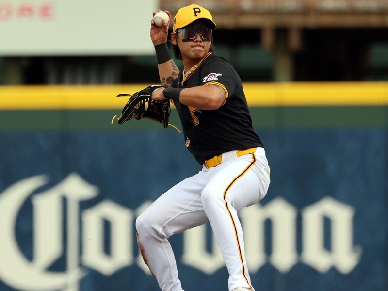 Mar 5, 2024; Bradenton, Florida, USA;  Pittsburgh Pirates infielder/outfielder Ji Hwan Bae (3) in action during the third inning against the Toronto Blue Jays at LECOM Park. Mandatory Credit: Kim Klement Neitzel-USA TODAY Sports