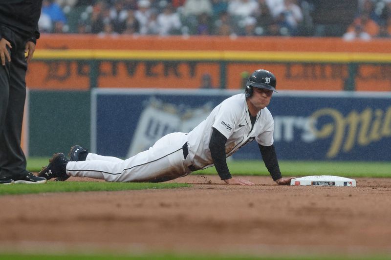 Sep 28, 2024; Detroit, Michigan, USA; Detroit Tigers outfielder Kerry Carpenter (30) is called out at second base during the first inning of the game against the Chicago White Sox at Comerica Park. Mandatory Credit: Brian Bradshaw Sevald-Imagn Images