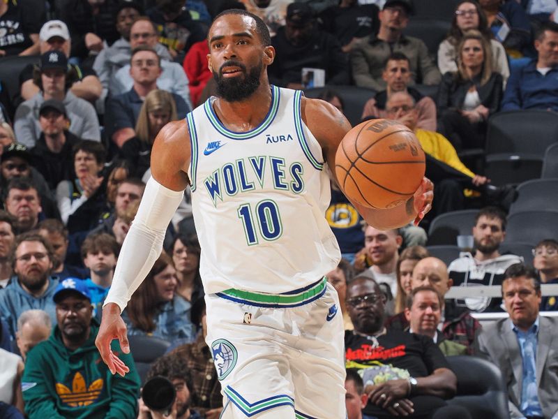 INDIANAPOLIS, IN - MARCH 7: Mike Conley #10 of the Minnesota Timberwolves dribbles the ball during the game against the Indiana Pacers on March 7, 2024 at Gainbridge Fieldhouse in Indianapolis, Indiana. NOTE TO USER: User expressly acknowledges and agrees that, by downloading and or using this Photograph, user is consenting to the terms and conditions of the Getty Images License Agreement. Mandatory Copyright Notice: Copyright 2024 NBAE (Photo by Ron Hoskins/NBAE via Getty Images)