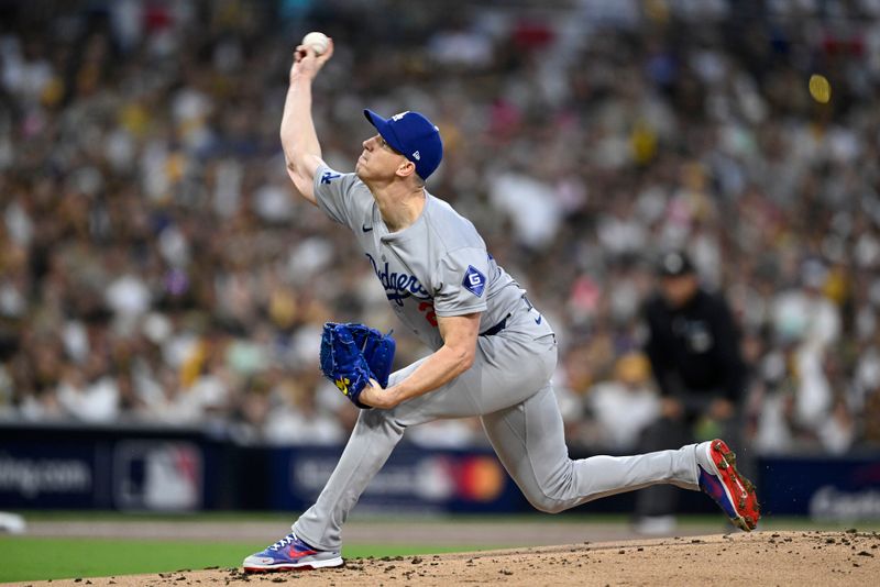 Oct 8, 2024; San Diego, California, USA; Los Angeles Dodgers pitcher Walker Buehler (21) throws in the first inning against the San Diego Padres during game three of the NLDS for the 2024 MLB Playoffs at Petco Park.  Mandatory Credit: Denis Poroy-Imagn Images