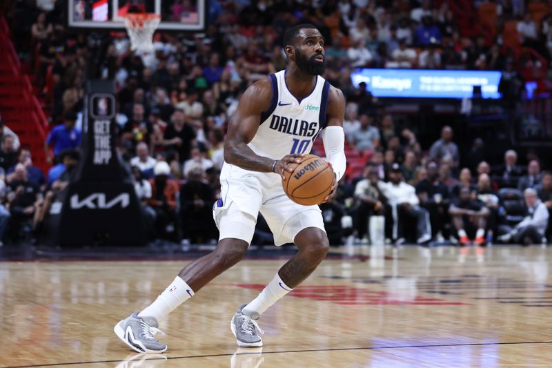 MIAMI, FLORIDA - APRIL 10: Tim Hardaway Jr. #10 of the Dallas Mavericks prepares to shoot the ball against the Miami Heat during the second quarter of the game at Kaseya Center on April 10, 2024 in Miami, Florida. NOTE TO USER: User expressly acknowledges and agrees that, by downloading and or using this photograph, User is consenting to the terms and conditions of the Getty Images License Agreement. (Photo by Megan Briggs/Getty Images)