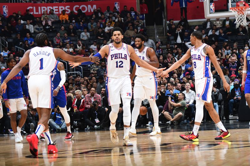 LOS ANGELES, CA - JANUARY 17: James Harden #1, Tobias Harris #12, and De'Anthony Melton #8 of the Philadelphia 76ers high five during the game during the game against the LA Clippers on January 17, 2023 at Crypto.Com Arena in Los Angeles, California. NOTE TO USER: User expressly acknowledges and agrees that, by downloading and/or using this Photograph, user is consenting to the terms and conditions of the Getty Images License Agreement. Mandatory Copyright Notice: Copyright 2023 NBAE (Photo by Adam Pantozzi/NBAE via Getty Images)