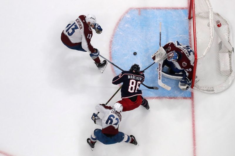 Apr 3, 2025; Columbus, Ohio, USA; Columbus Blue Jackets right wing Kirill Marchenko (86) looks for a rebound of a Colorado Avalanche goalie MacKenzie Blackwood (39) save during the second period at Nationwide Arena. Mandatory Credit: Russell LaBounty-Imagn Images