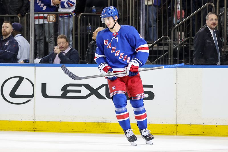 Apr 2, 2025; New York, New York, USA;  New York Rangers defenseman Braden Schneider (4) celebrates after scoring a goal in the first period against the Minnesota Wild at Madison Square Garden. Mandatory Credit: Wendell Cruz-Imagn Images