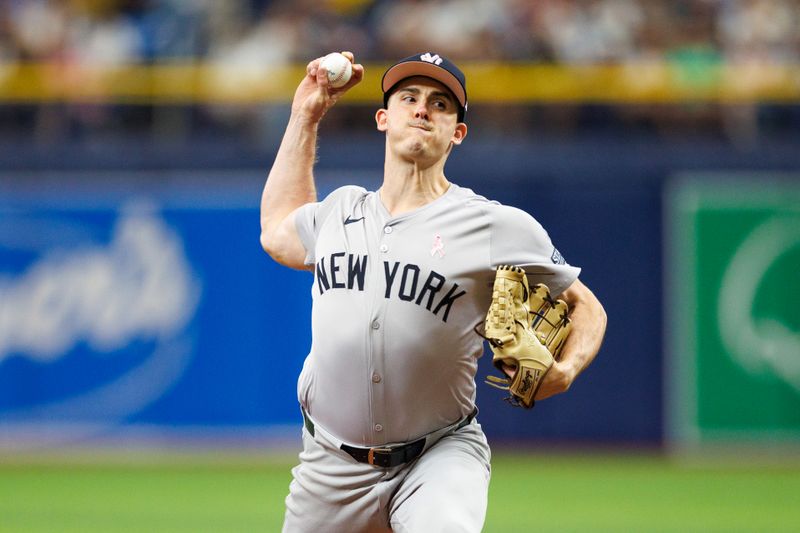 May 12, 2024; St. Petersburg, Florida, USA;  New York Yankees pitcher Nick Burdi (57) throws a pitch against the Tampa Bay Rays in the seventh inning at Tropicana Field. Mandatory Credit: Nathan Ray Seebeck-USA TODAY Sports