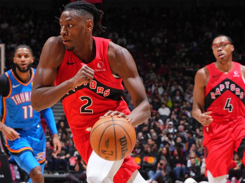 TORONTO, CANADA - DECEMBER 05:  Jonathan Mogbo #2 of the Toronto Raptors drives to the basket during the game against the Oklahoma City Thunder on December 05, 2024 at the Scotiabank Arena in Toronto, Ontario, Canada.  NOTE TO USER: User expressly acknowledges and agrees that, by downloading and or using this Photograph, user is consenting to the terms and conditions of the Getty Images License Agreement.  Mandatory Copyright Notice: Copyright 2024 NBAE (Photo by Mark Blinch/NBAE via Getty Images)