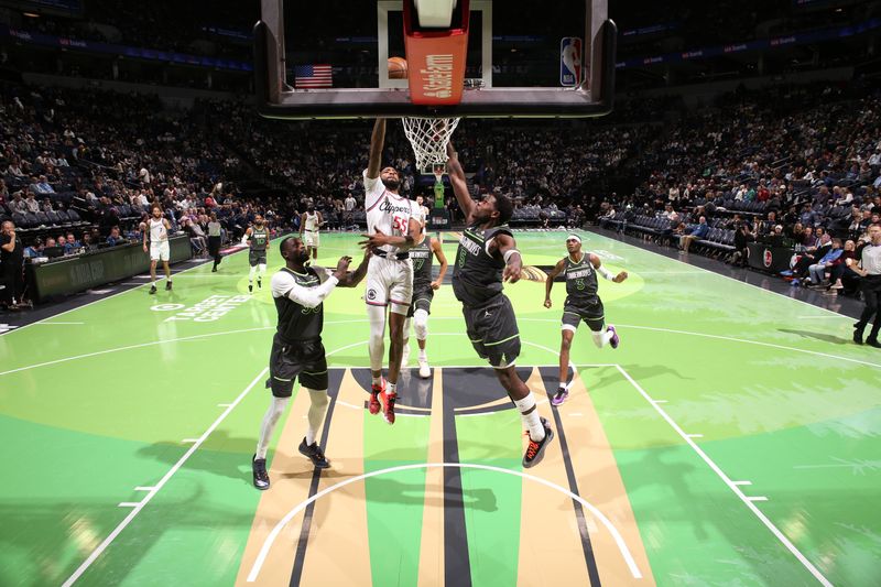 MINNEAPOLIS, MN -  NOVEMBER 29: Derrick Jones Jr. #55 of the LA Clippers drives to the basket during the game against the Minnesota Timberwolves during the Emirates NBA Cup game on November 29, 2024 at Target Center in Minneapolis, Minnesota. NOTE TO USER: User expressly acknowledges and agrees that, by downloading and or using this Photograph, user is consenting to the terms and conditions of the Getty Images License Agreement. Mandatory Copyright Notice: Copyright 2024 NBAE (Photo by David Sherman/NBAE via Getty Images)