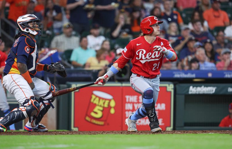 Jun 18, 2023; Houston, Texas, USA; Cincinnati Reds center fielder TJ Friedl (29) hits an RBI single during the third inning against the Houston Astros at Minute Maid Park. Mandatory Credit: Troy Taormina-USA TODAY Sports