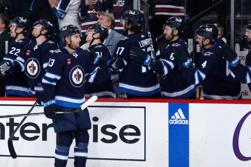 Apr 4, 2024; Winnipeg, Manitoba, CAN; Winnipeg Jets center Gabriel Vilardi (13) celebrates his first period goal against the Calgary Flames at Canada Life Centre. Mandatory Credit: James Carey Lauder-USA TODAY Sports