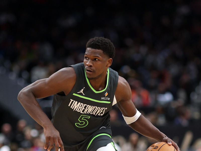 WASHINGTON, DC - JANUARY 13: Anthony Edwards #5 of the Minnesota Timberwolves dribbles the ball up the court against the Washington Wizards during the first half at Capital One Arena on January 13, 2025 in Washington, DC. NOTE TO USER: User expressly acknowledges and agrees that, by downloading and or using this photograph, User is consenting to the terms and conditions of the Getty Images License Agreement. (Photo by Patrick Smith/Getty Images)