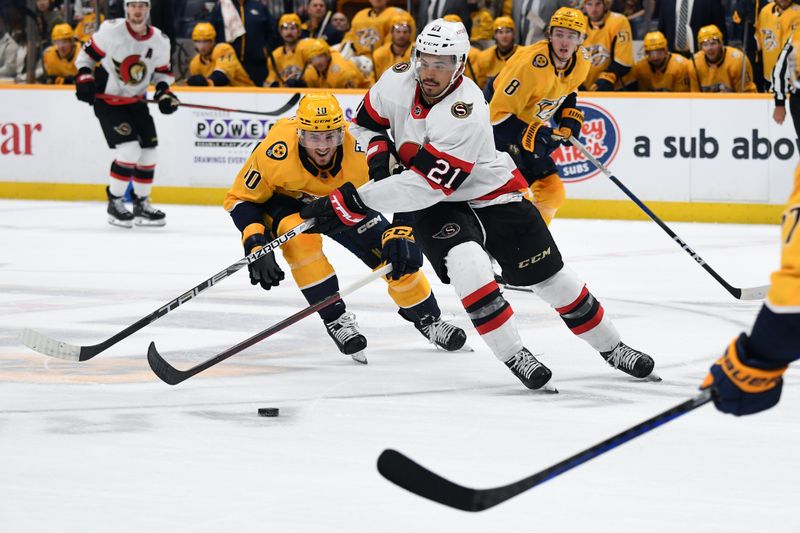 Feb 27, 2024; Nashville, Tennessee, USA; Ottawa Senators right wing Mathieu Joseph (21) handles the puck in the offensive zone during the second period against the Nashville Predators at Bridgestone Arena. Mandatory Credit: Christopher Hanewinckel-USA TODAY Sports