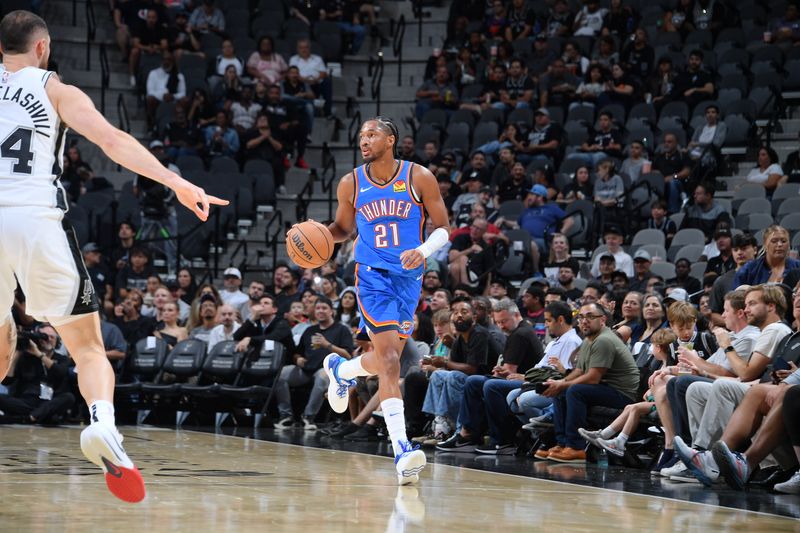 SAN ANTONIO, TX - OCTOBER 7: Aaron Wiggins #21 of the Oklahoma City Thunder dribbles the ball during the game against the San Antonio Spurs during a NBA preseason game on October 7, 2024 at the Frost Bank Center in San Antonio, Texas. NOTE TO USER: User expressly acknowledges and agrees that, by downloading and or using this photograph, user is consenting to the terms and conditions of the Getty Images License Agreement. Mandatory Copyright Notice: Copyright 2024 NBAE (Photos by Michael Gonzales/NBAE via Getty Images)