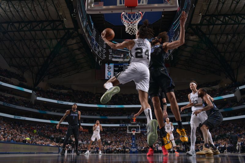 DALLAS, TX - FEBRUARY 14: Devin Vassell #24 of the San Antonio Spurs drives to the basket during the game against the Dallas Mavericks on February 14, 2024 at the American Airlines Center in Dallas, Texas. NOTE TO USER: User expressly acknowledges and agrees that, by downloading and or using this photograph, User is consenting to the terms and conditions of the Getty Images License Agreement. Mandatory Copyright Notice: Copyright 2024 NBAE (Photo by Glenn James/NBAE via Getty Images)