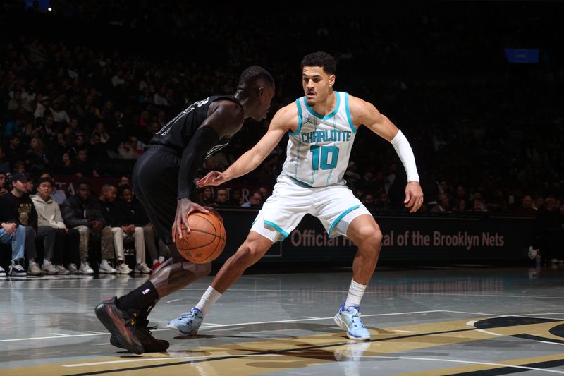 BROOKLYN, NY - NOVEMBER 19: Josh Green #10 of the Charlotte Hornets plays defense during the game against the Brooklyn Nets during an Emirates NBA Cup game on November 19, 2024 at Barclays Center in Brooklyn, New York. NOTE TO USER: User expressly acknowledges and agrees that, by downloading and or using this Photograph, user is consenting to the terms and conditions of the Getty Images License Agreement. Mandatory Copyright Notice: Copyright 2024 NBAE (Photo by Nathaniel S. Butler/NBAE via Getty Images)