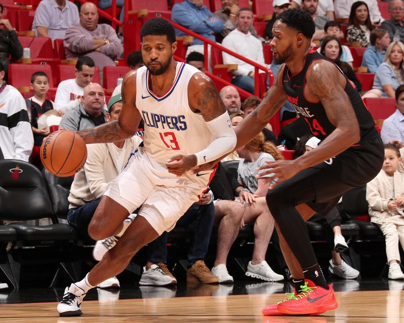 MIAMI, FL - FEBRUARY 4: Paul George #13 of the LA Clippers dribbles the ball during the game against the Miami Heat on February 4, 2024 at Kaseya Center in Miami, Florida. NOTE TO USER: User expressly acknowledges and agrees that, by downloading and or using this Photograph, user is consenting to the terms and conditions of the Getty Images License Agreement. Mandatory Copyright Notice: Copyright 2024 NBAE (Photo by Issac Baldizon/NBAE via Getty Images)