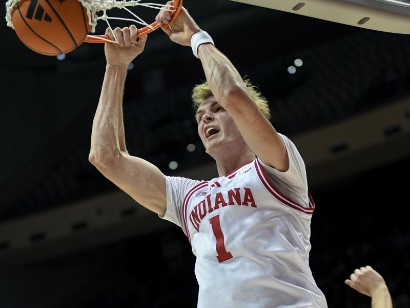 Dec 9, 2025; Bloomington, Indiana, USA; Indiana Hoosiers forward Reed Bailey (1) dunks the ball during the first half against the Penn State Nittany Lions  at Simon Skjodt Assembly Hall. Mandatory Credit: Robert Goddin-Imagn Images