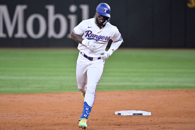 Oct 10, 2023; Arlington, Texas, USA; Texas Rangers right fielder Adolis Garcia (53) runs after hitting a three run home run against the Baltimore Orioles in the second inning during game three of the ALDS for the 2023 MLB playoffs at Globe Life Field. Mandatory Credit: Jerome Miron-USA TODAY Sports