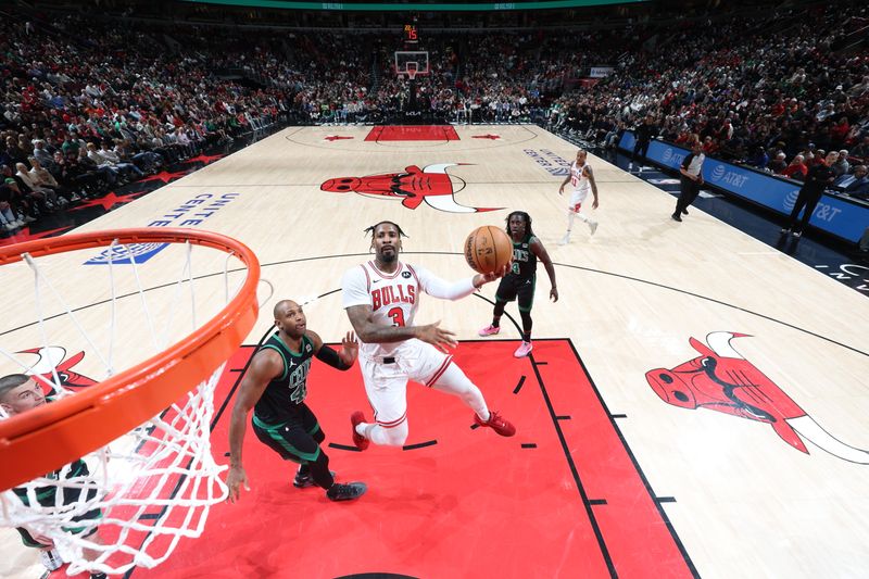 CHICAGO, IL - FEBRUARY 22: Andre Drummond #3 of the Chicago Bulls drives to the basket during the game against the Boston Celtics on February 22, 2024 at United Center in Chicago, Illinois. NOTE TO USER: User expressly acknowledges and agrees that, by downloading and or using this photograph, User is consenting to the terms and conditions of the Getty Images License Agreement. Mandatory Copyright Notice: Copyright 2024 NBAE (Photo by Jeff Haynes/NBAE via Getty Images)