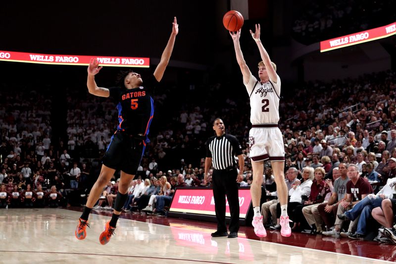 Jan 18, 2023; College Station, Texas, USA; Texas A&M Aggies guard Hayden Hefner (2) shoots the ball while Florida Gators guard Will Richard (5) defends during the second half at Reed Arena. Mandatory Credit: Erik Williams-USA TODAY Sports
