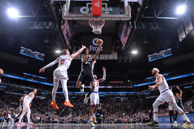 SAN ANTONIO, TX - MARCH 29: Devin Vassell #24 of the San Antonio Spurs drives to the basket during the game against the New York Knicks on March 29, 2024 at the Frost Bank Center in San Antonio, Texas. NOTE TO USER: User expressly acknowledges and agrees that, by downloading and or using this photograph, user is consenting to the terms and conditions of the Getty Images License Agreement. Mandatory Copyright Notice: Copyright 2024 NBAE (Photos by Michael Gonzales/NBAE via Getty Images)