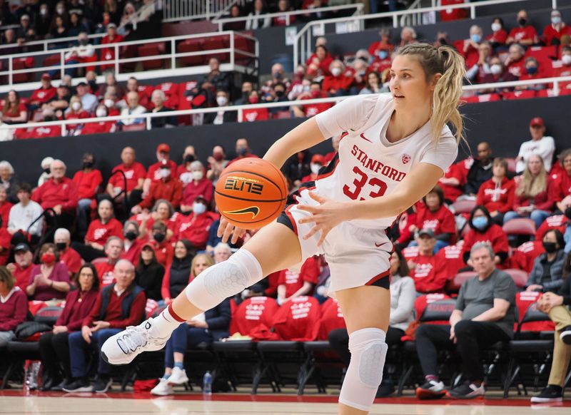 Jan 22, 2023; Stanford, California, USA; Stanford Cardinal guard Hannah Jump (33) keeps the ball in play against the Colorado Buffaloes during the first quarter at Maples Pavilion. Mandatory Credit: Kelley L Cox-USA TODAY Sports