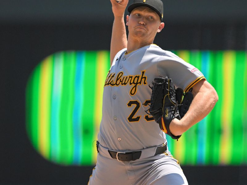 Jul 13, 2025; Minneapolis, Minnesota, USA;  Pittsburgh Pirates starting pitcher Mitch Keller (23) delivers a pitch against the Minnesota Twins during the first inning at Target Field. Mandatory Credit: Nick Wosika-Imagn Images