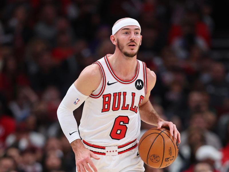 CHICAGO, ILLINOIS - DECEMBER 02: Alex Caruso #6 of the Chicago Bulls dribbles up the court against the New Orleans Pelicans during the first half at the United Center on December 02, 2023 in Chicago, Illinois. NOTE TO USER: User expressly acknowledges and agrees that, by downloading and or using this photograph, User is consenting to the terms and conditions of the Getty Images License Agreement.  (Photo by Michael Reaves/Getty Images)