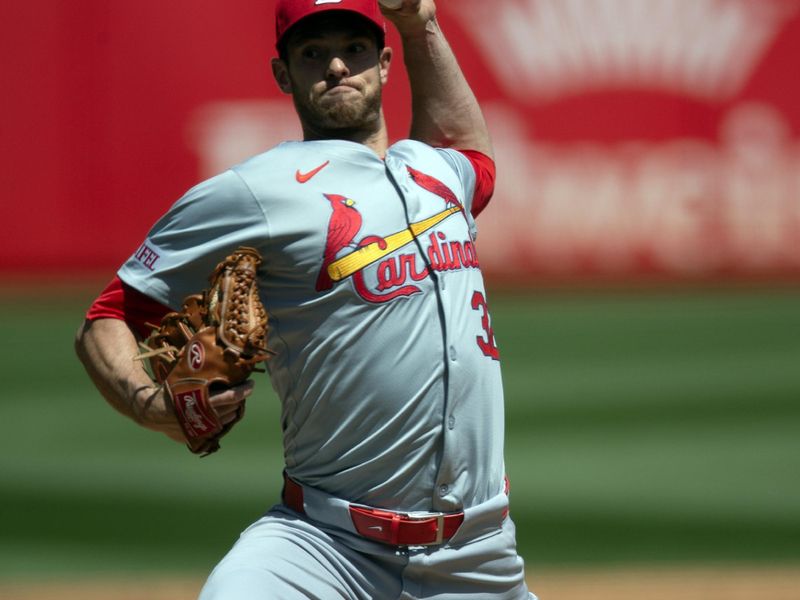 Apr 17, 2024; Oakland, California, USA; St. Louis Cardinals starting pitcher Steven Matz (32) delivers a pitch against the Oakland Athletics during the second inning at Oakland-Alameda County Coliseum. Mandatory Credit: D. Ross Cameron-USA TODAY Sports